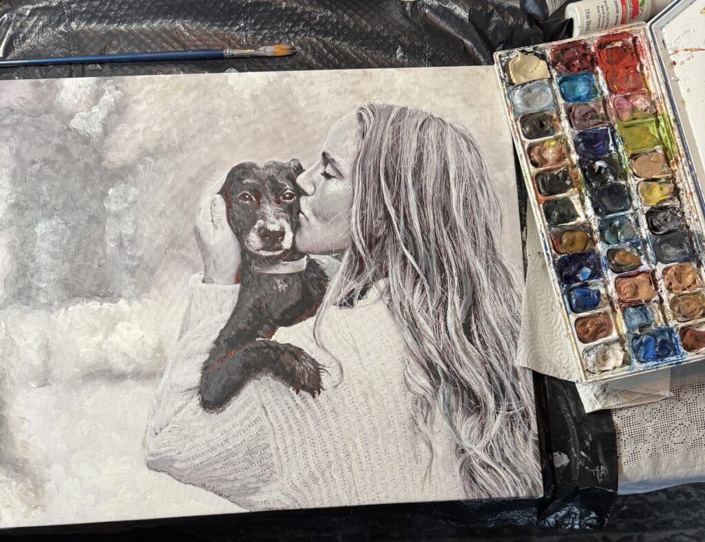 Portrait of a young woman and her dog in black and white by Maryanne Chisholm