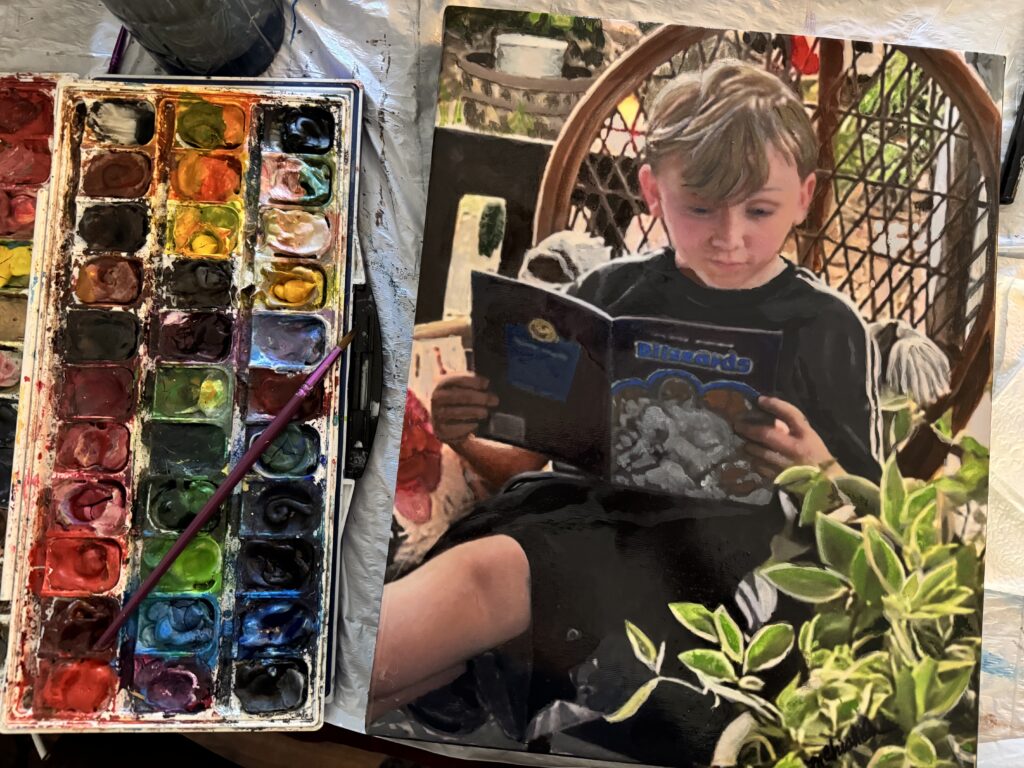 Portrait of a boy reading on a patio with plants by artist Maryanne Chisholm