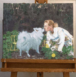 Portrait of a woman kissing her miniature Samoyed dog